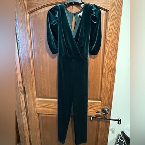 Elegant Adelyn Rae Velvet Jumpsuit in emerald Green